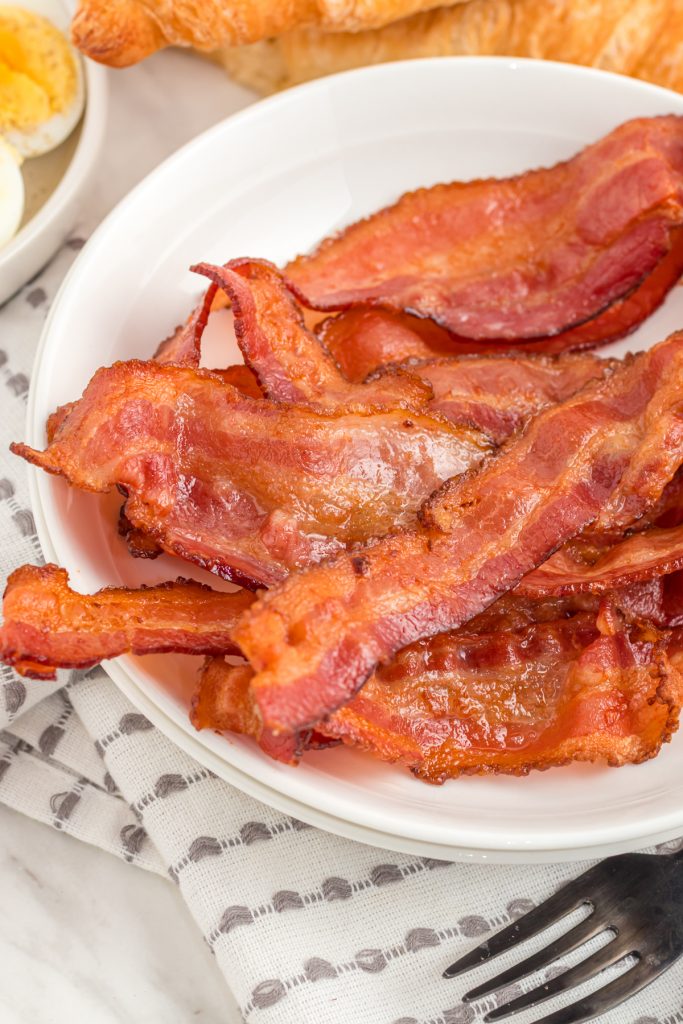 close up of bacon on a plate