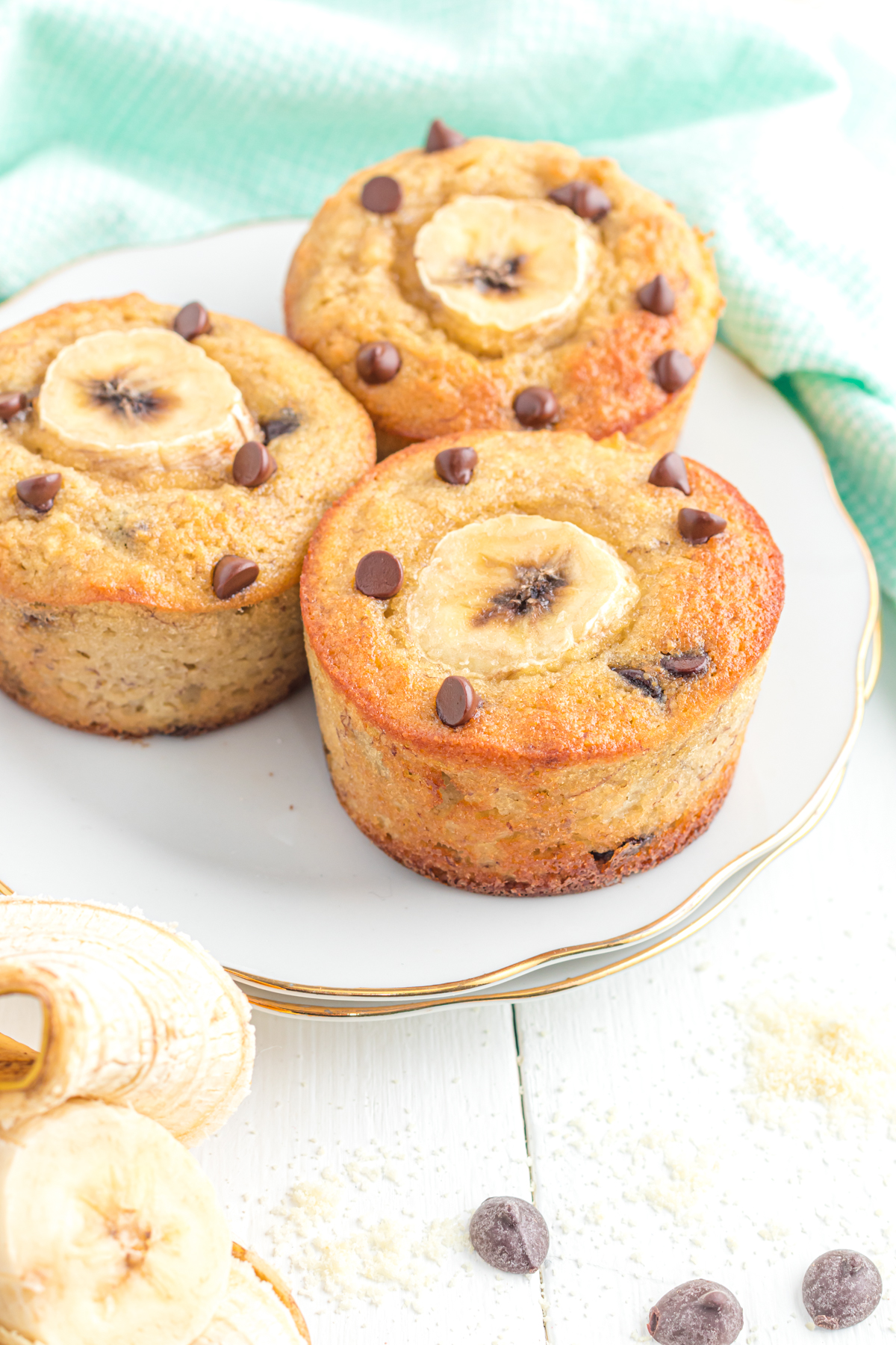 Three banana muffins with almond flour on a plate. 