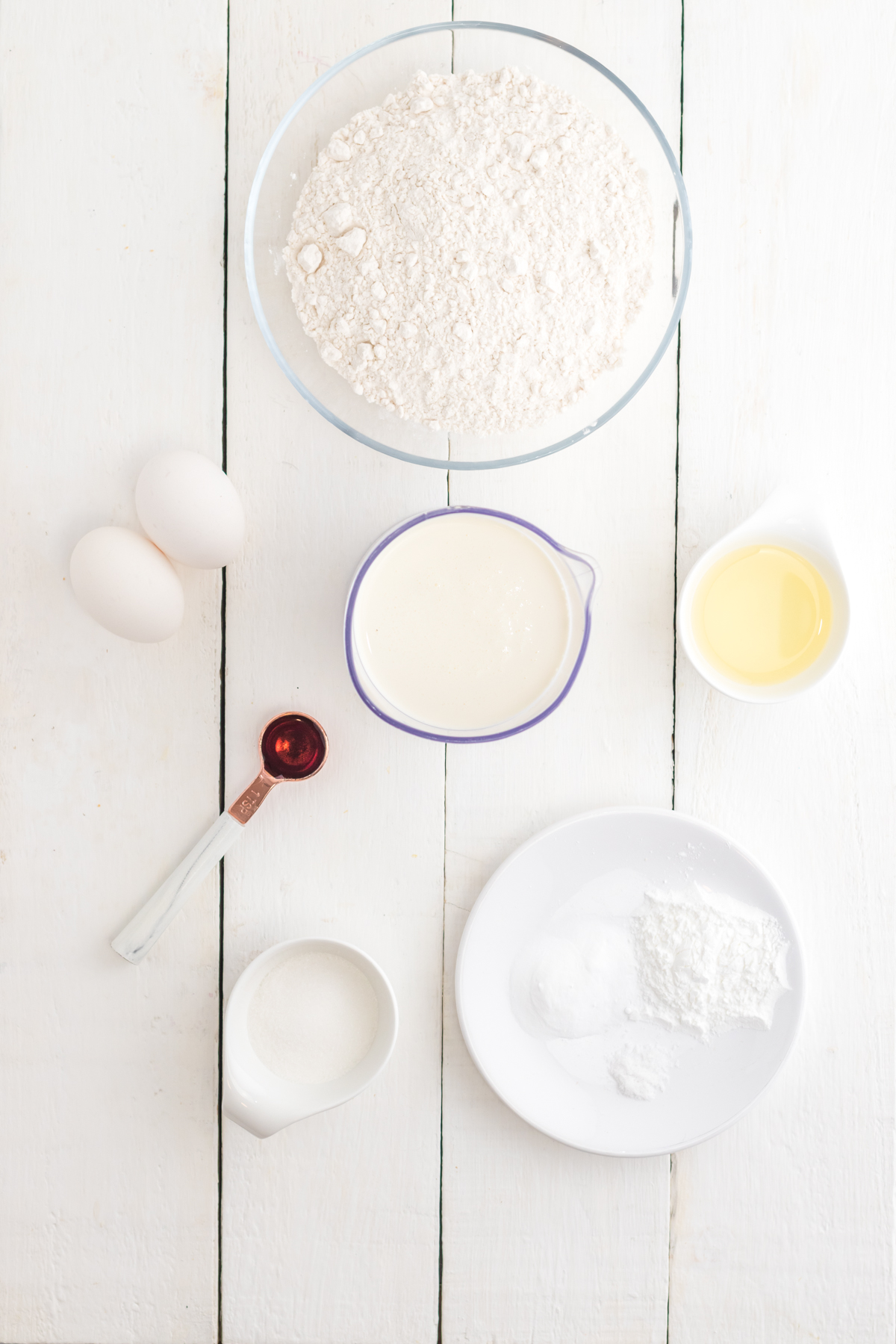 Ingredients to make sweet cream pancakes.