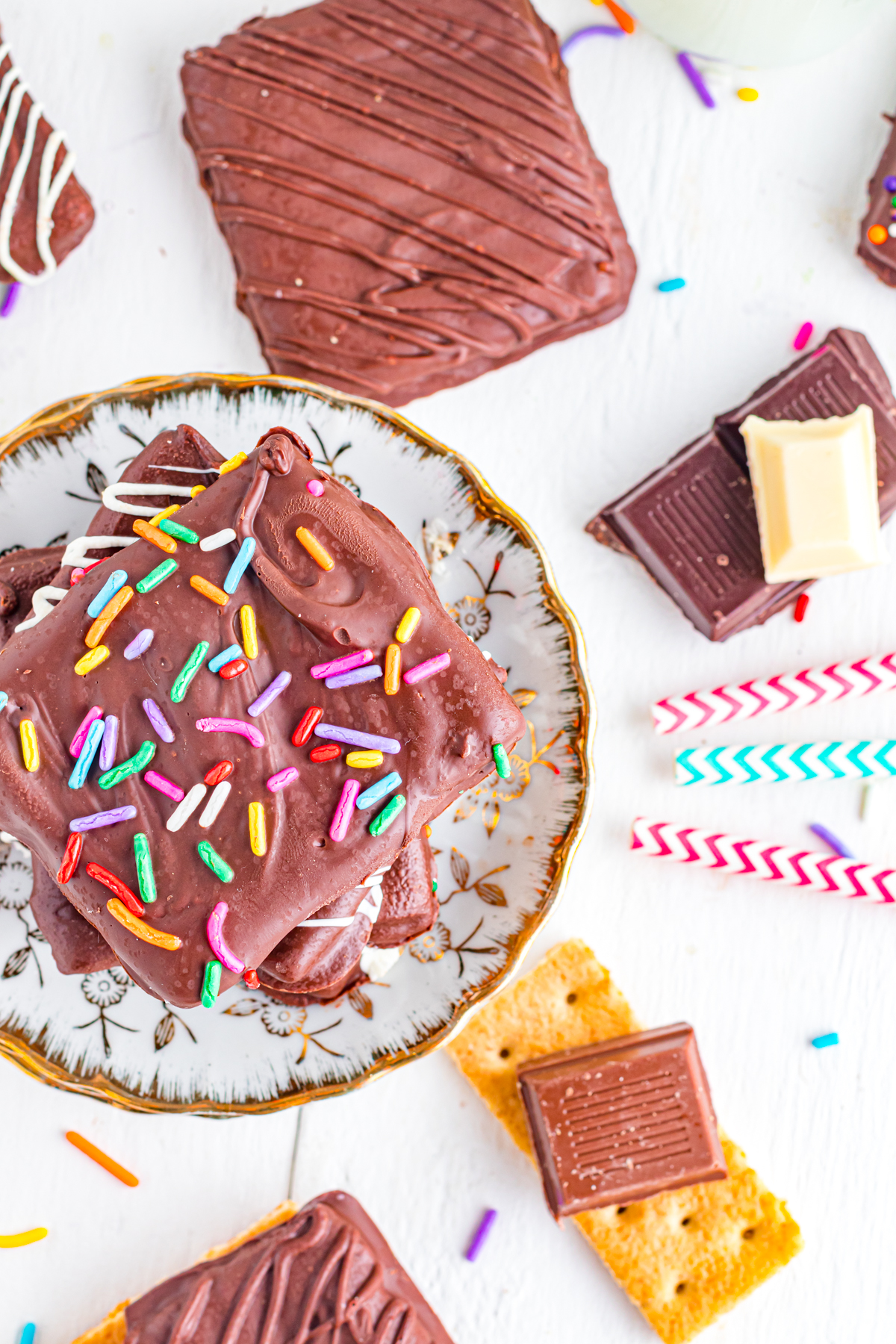 Chocolate dipped graham crackers with sprinkles on top.