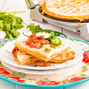 Quesadilla in waffle maker on a plate.
