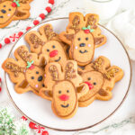 Gingerbread reindeer cookies on a plate.