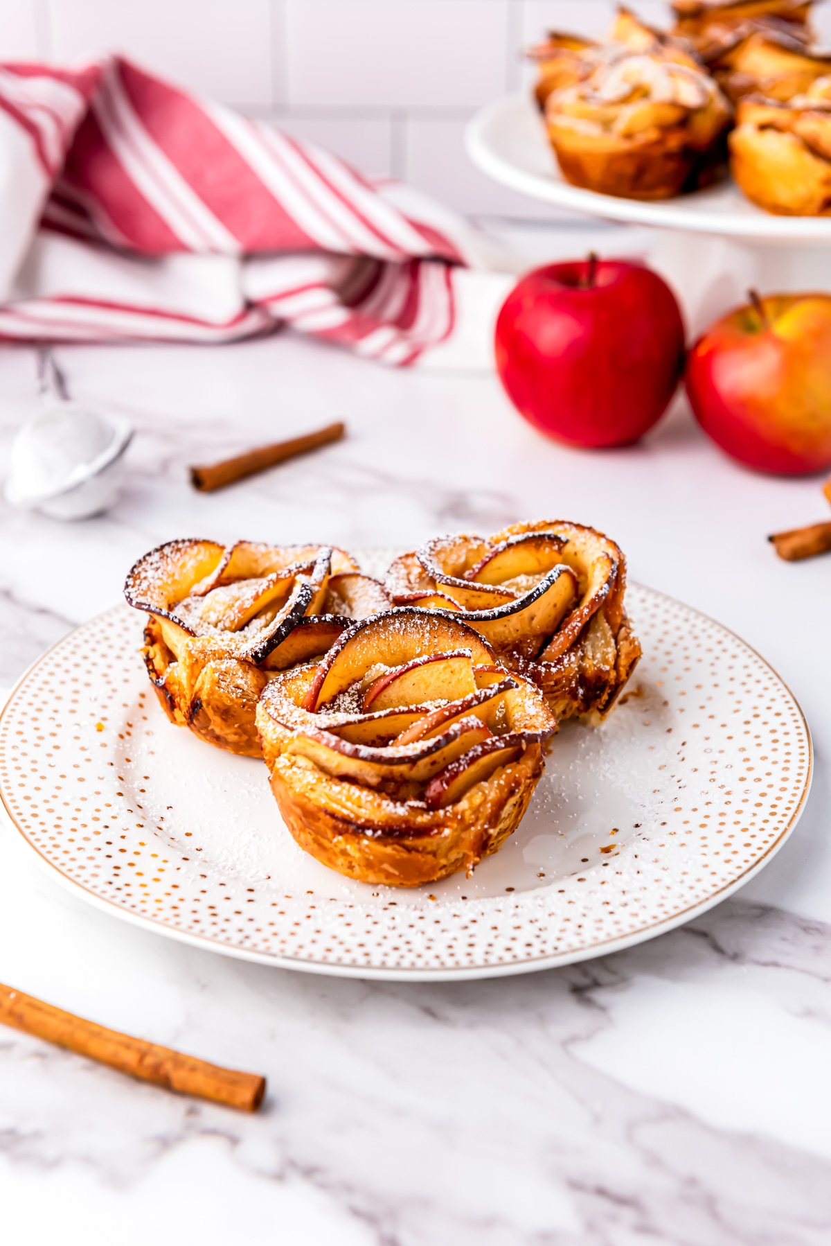 Apple rose pastries on plate.