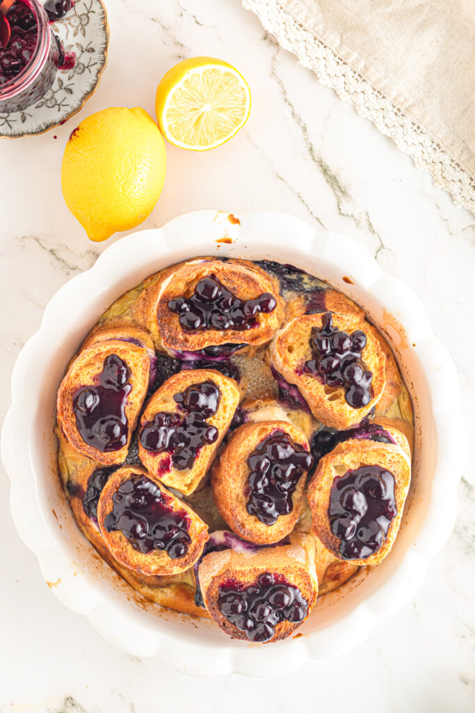 Baked french toast topped with blueberries.