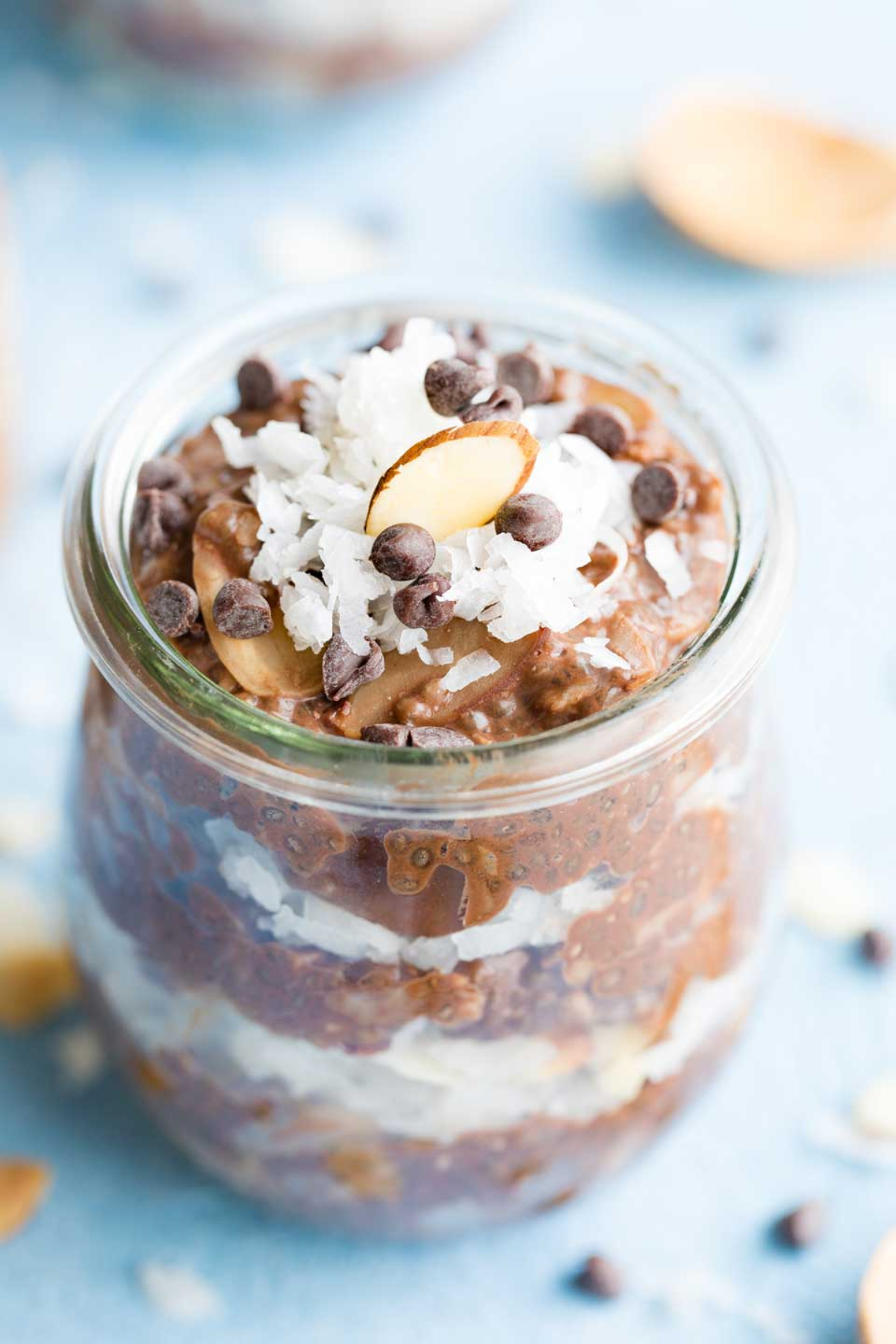 Chia pudding topped with chocolate almonds and coconut.