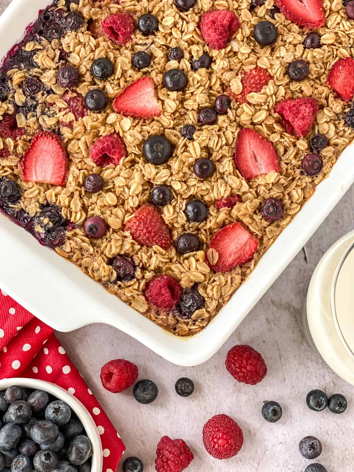 MIXED BERRY OATEMEAL IN PAN ON TABLE.