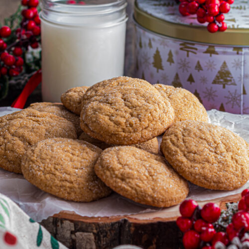 Gingersnap cookies on a plate on a holiday table.